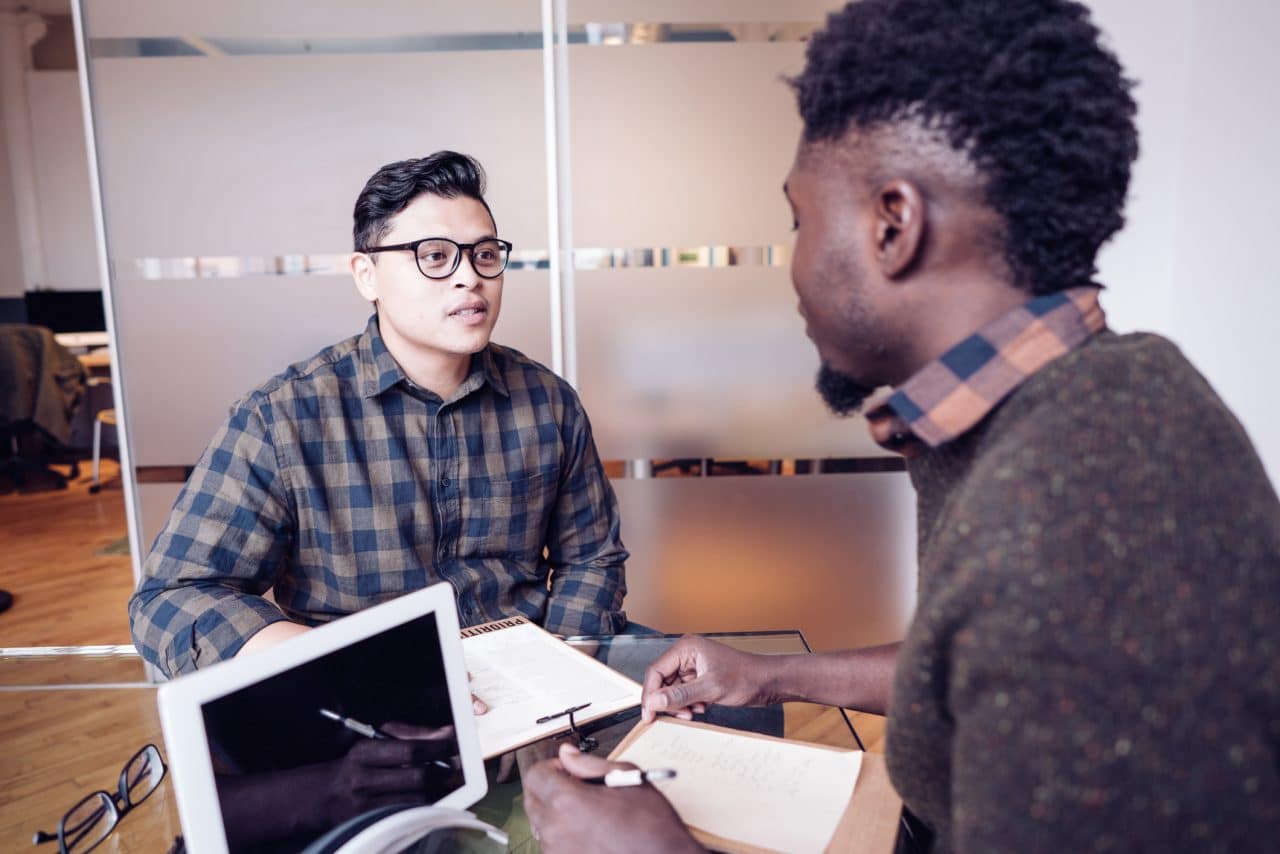 Men talking in the office