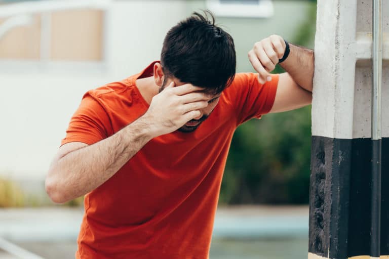 Man experiencing an episode of dizziness 