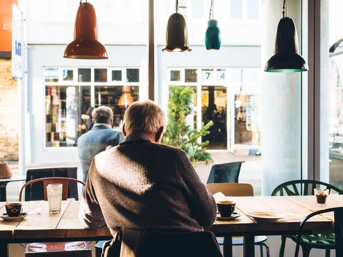 Man sitting inside coffee shop