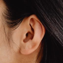 Close up of woman's ear.